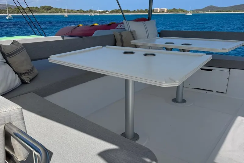 Amura Yacht Photos Pics Luxurious seating area on a 2021 Bali 5.4 Open Space yacht with ocean view.
