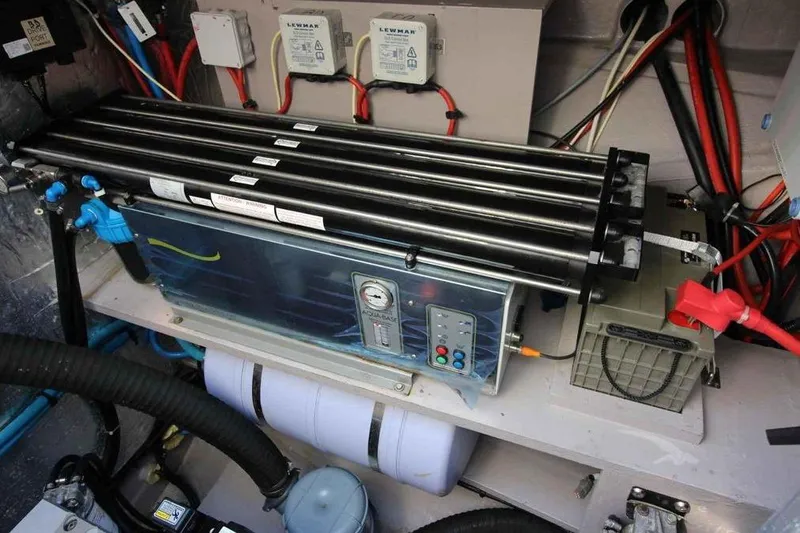 Amura Yacht Photos Pics Engine room of a 2021 Bali 5.4 Open Space yacht with complex wiring and equipment.