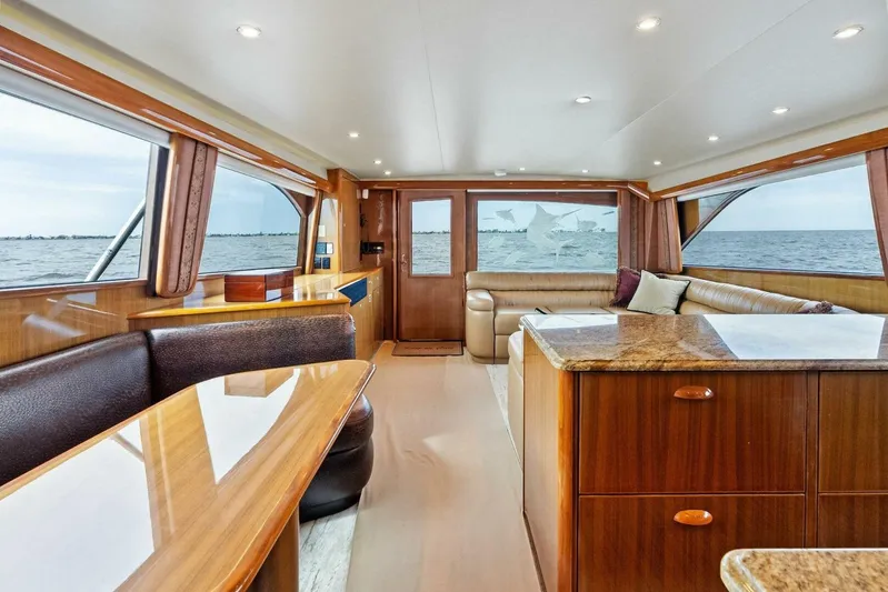 Knot On Call Yacht Photos Pics Luxurious interior of 2006 Viking 61 Convertible yacht with ocean view.