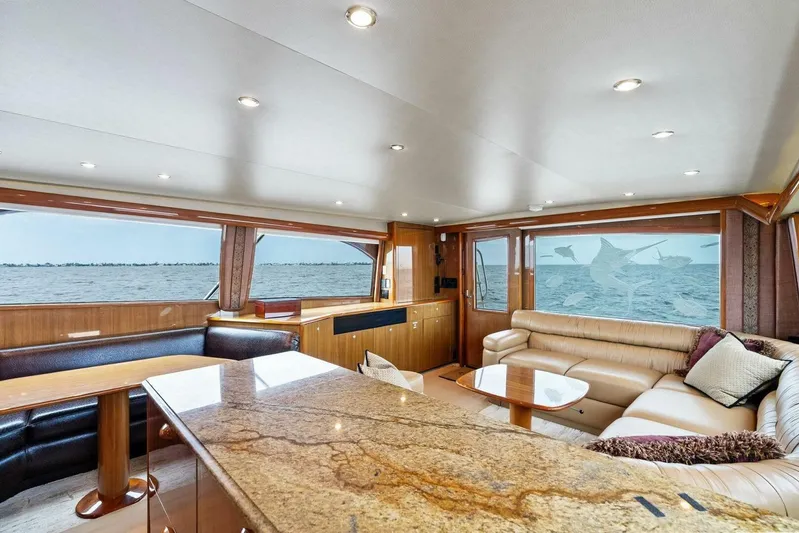 Knot On Call Yacht Photos Pics Luxurious interior of 2006 Viking 61 Convertible yacht with ocean view.