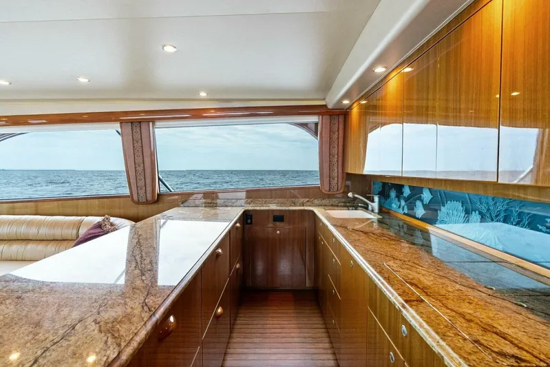 Knot On Call Yacht Photos Pics Luxurious interior of 2006 Viking 61 Convertible yacht with ocean view.