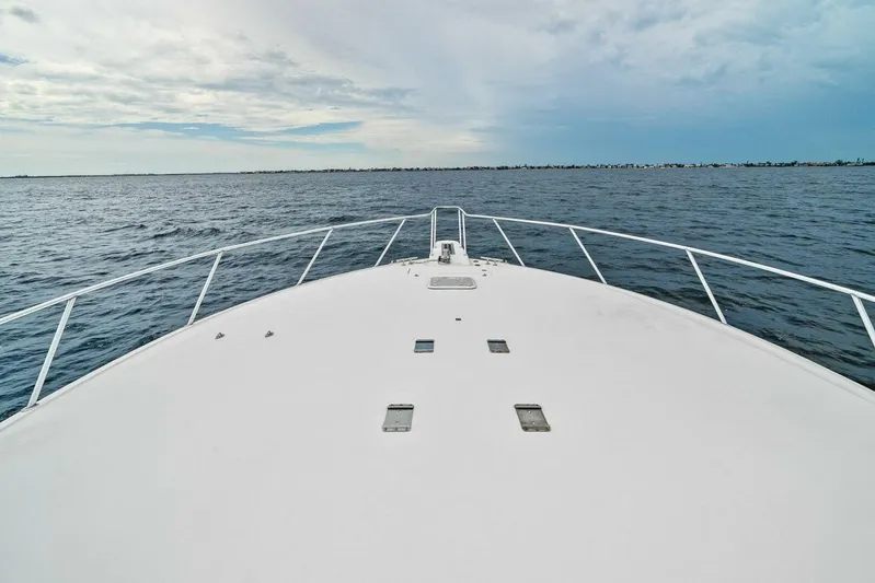 Knot On Call Yacht Photos Pics Bow view of 2006 Viking 61 Convertible yacht on open water.