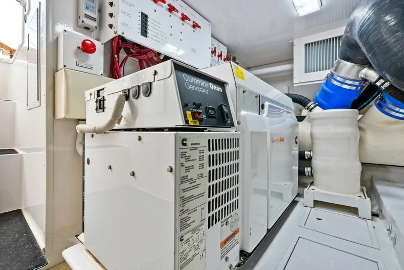 Knot On Call Yacht Photos Pics Engine room of 2006 Viking 61 Convertible yacht with Cummins Onan generator.