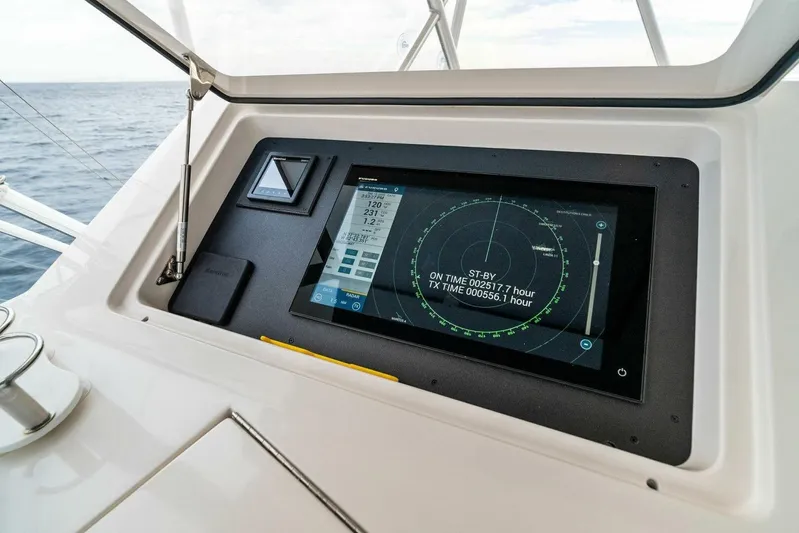 Knot On Call Yacht Photos Pics Control panel of a 2006 Viking 61 Convertible yacht with radar display.