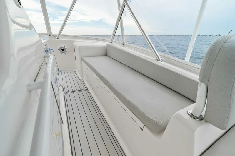 Knot On Call Yacht Photos Pics 2006 Viking 61 Convertible yacht interior with sleek seating and ocean view.