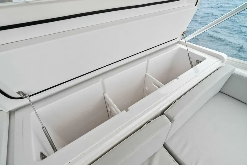Knot On Call Yacht Photos Pics Open storage compartment on 2006 Viking 61 Convertible yacht, with ocean view.