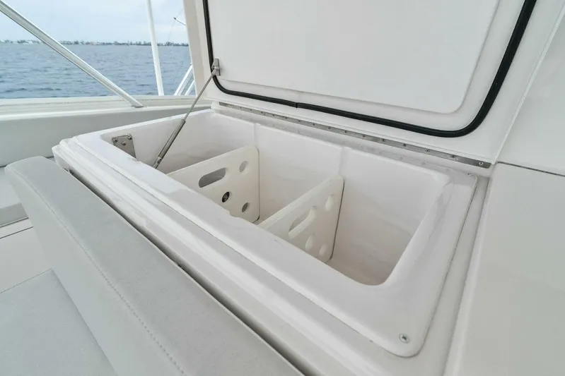 Knot On Call Yacht Photos Pics Open storage compartment on 2006 Viking 61 Convertible yacht, with ocean view.