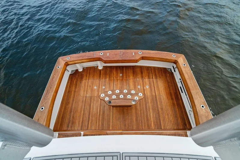 Knot On Call Yacht Photos Pics 2006 Viking 61 Convertible yacht's teak deck overlooking the ocean.