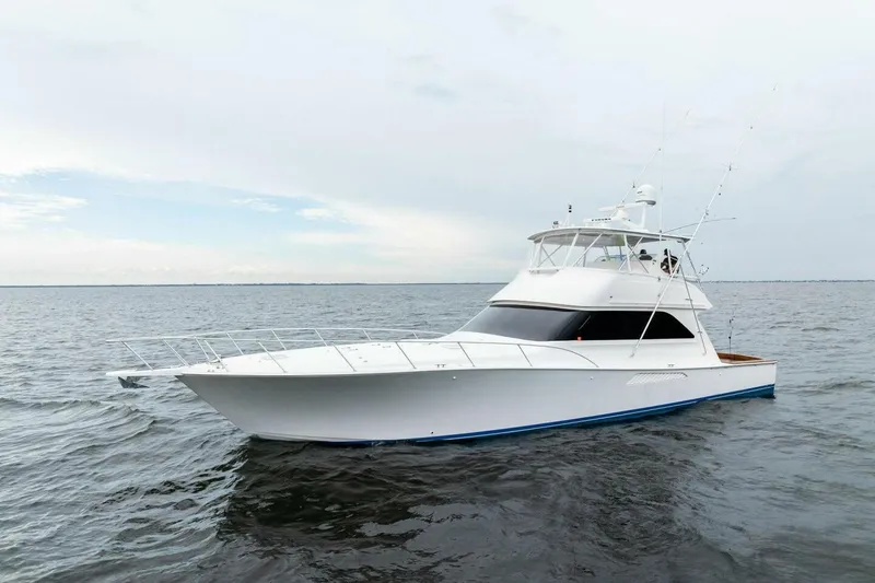 Knot On Call Yacht Photos Pics 2006 Viking 61 Convertible yacht cruising on open water.