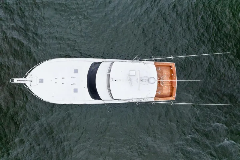 Knot On Call Yacht Photos Pics Top view of a 2006 Viking 61 Convertible yacht on water.