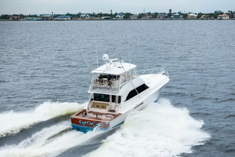 Knot On Call Yacht Photos Pics 2006 Viking 61 Convertible yacht cruising on open water.