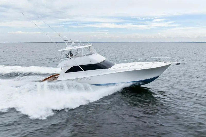 Knot On Call Yacht Photos Pics 2006 Viking 61 Convertible yacht cruising on open water.