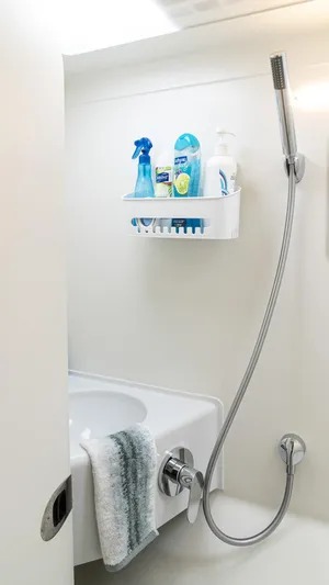 Nohea Yacht Photos Pics Modern bathroom in 2022 Custom Current Marine 46 yacht with shower and toiletries.