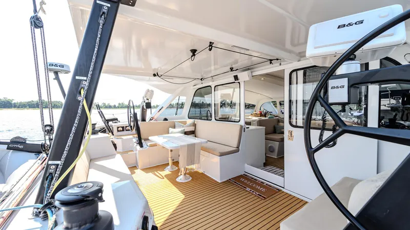 Nohea Yacht Photos Pics Luxurious 2022 Custom Current Marine 46 yacht interior with modern seating and navigation equipment.