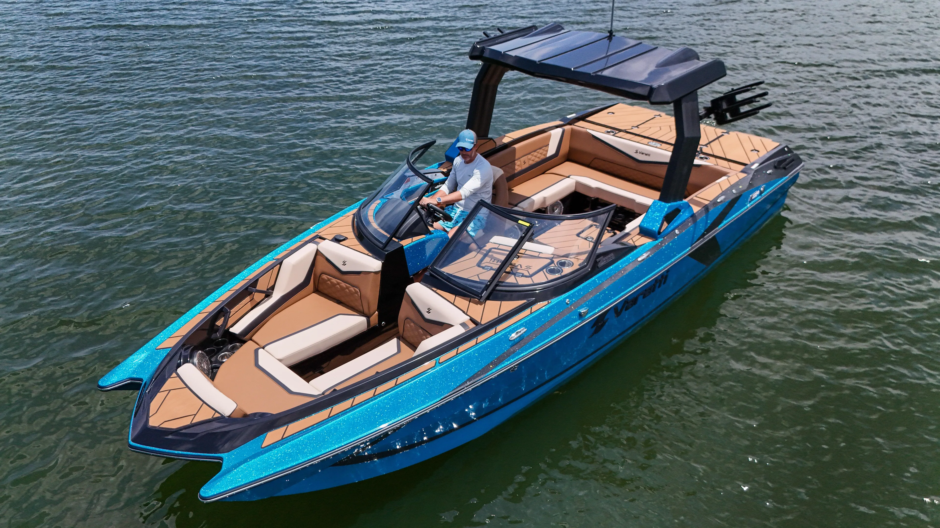  Yacht Photos Pics 2024 Varatti Z2373 boat on water, featuring sleek blue design and spacious seating.