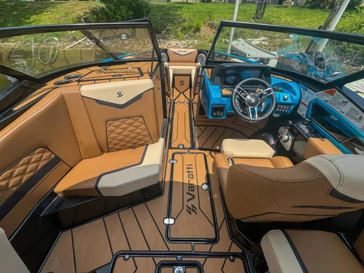  Yacht Photos Pics 2024 Varatti Z2373 boat interior with tan and black seating, modern dashboard, and spacious layout.