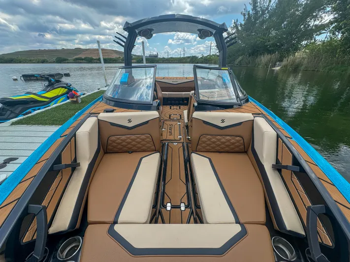  Yacht Photos Pics 2024 Varatti Z2373 boat interior with luxurious seating and modern design on a lake.