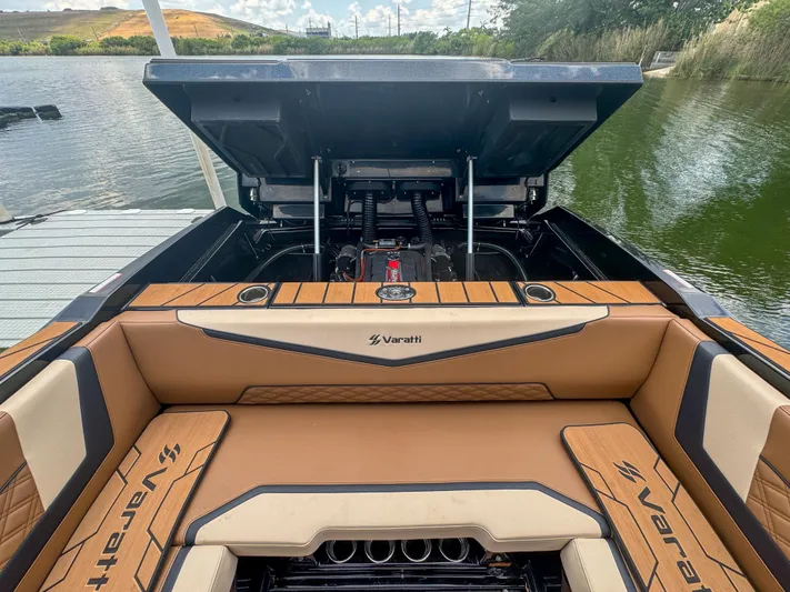  Yacht Photos Pics 2024 Varatti Z2373 boat with open engine compartment at dock.