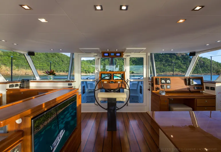 Cui Bono Yacht Photos Pics Interior of 2015 Gunboat 60 yacht with modern helm and panoramic windows.