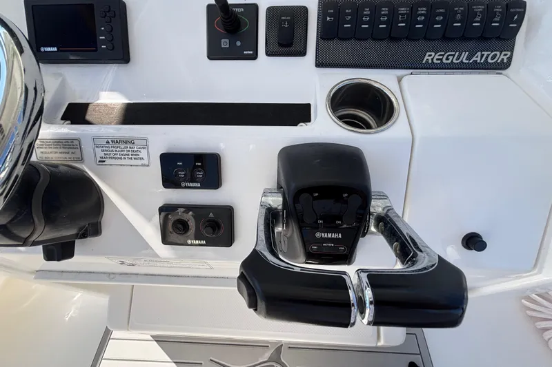  Yacht Photos Pics Control panel of a 2017 Regulator 28 boat with Yamaha throttle and switches.