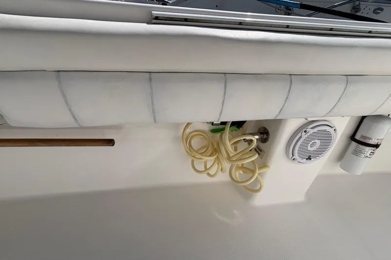  Yacht Photos Pics 2017 Regulator 28 boat interior with coiled hose, speaker, and fire extinguisher.