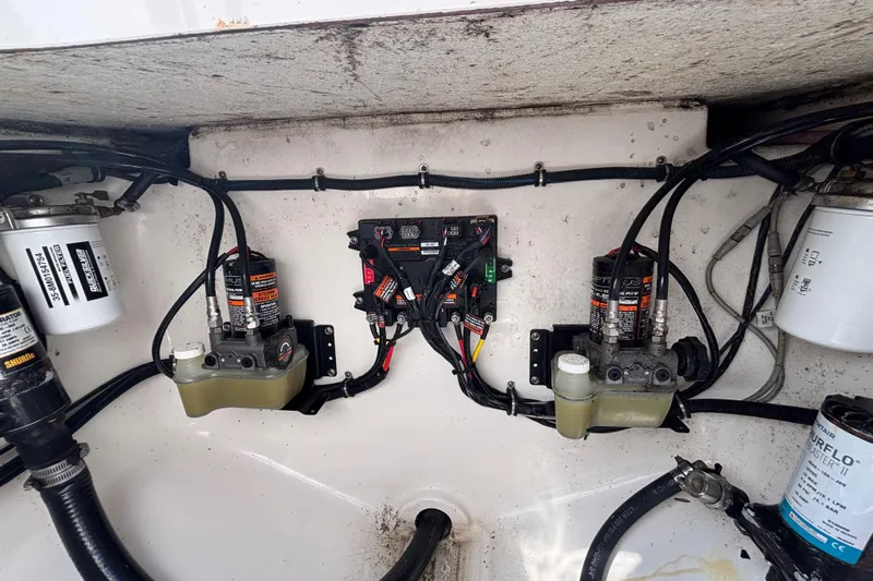 Yacht Photos Pics 2017 Regulator 28 boat engine compartment with wiring and hydraulic systems.