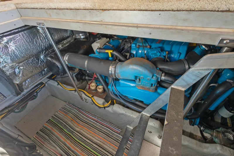  Yacht Photos Pics Engine room of a 2000 Silverton 392 Motor Yacht, featuring a blue engine.