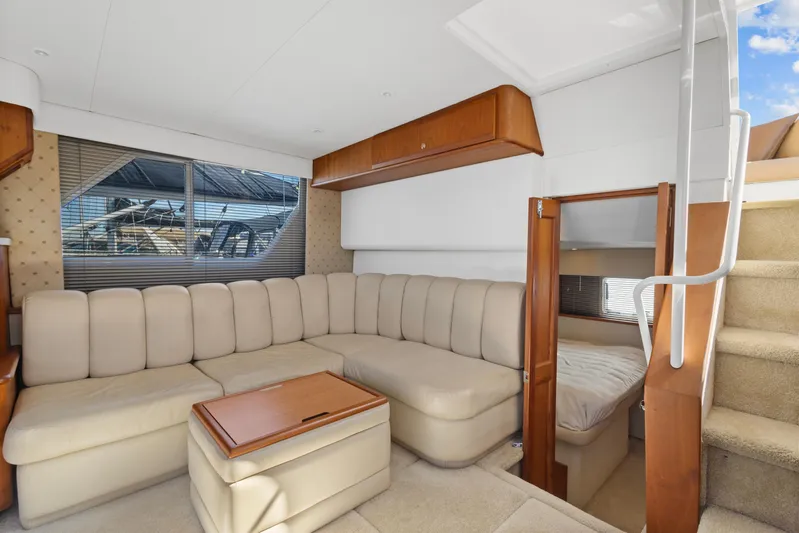 Yacht Photos Pics Interior of 2000 Silverton 392 Motor Yacht with beige seating and wooden accents.