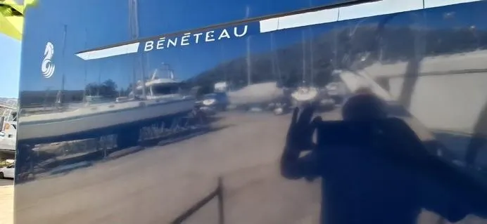  Yacht Photos Pics Beneteau Oceanis Clipper 393 yacht, 2006 model, reflecting marina surroundings.