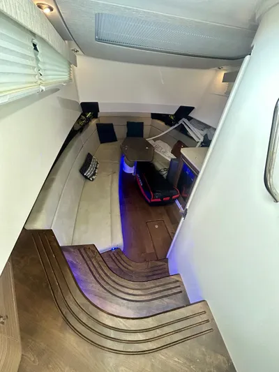  Yacht Photos Pics Interior of 2019 Boston Whaler 420 Outrage with modern seating and ambient lighting.