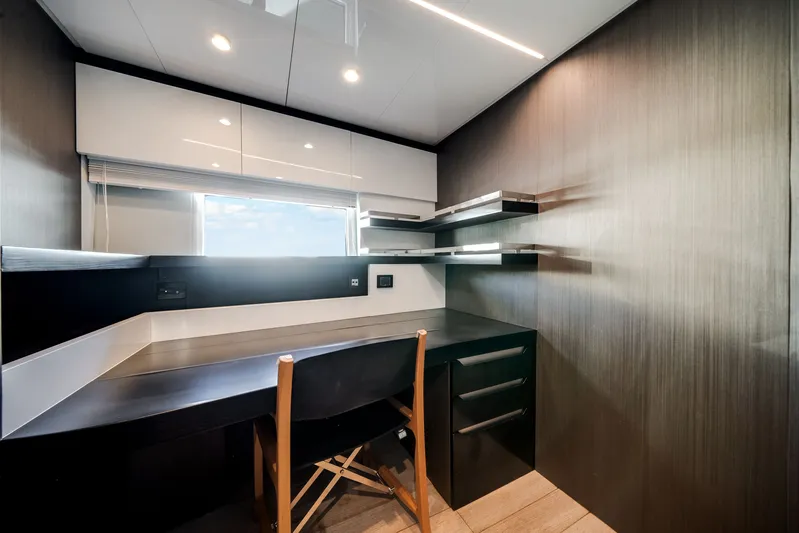  Yacht Photos Pics Interior of 2022 Azimut S7 with modern desk and shelves.