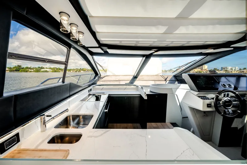  Yacht Photos Pics Interior of 2022 Azimut S7 yacht with modern kitchen and helm station.