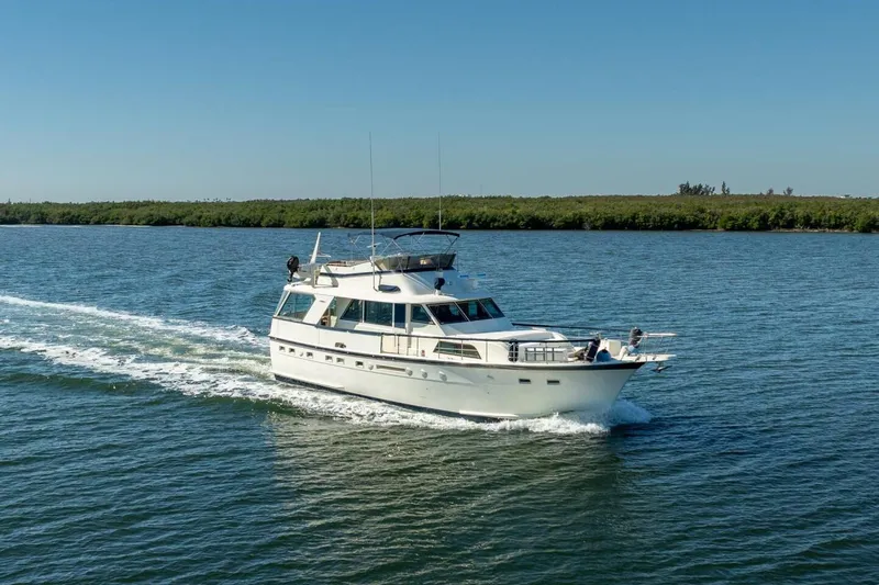 Even Keel Yacht Photos Pics 1985 Hatteras 53 Motor Yacht cruising on a sunny day.