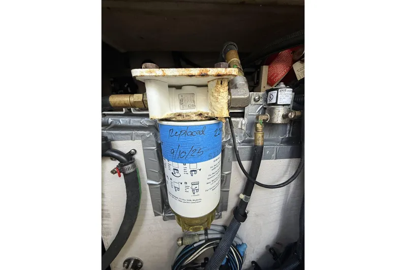  Yacht Photos Pics Fuel filter system in a 2015 Sea Ray 370 Venture boat, labeled with replacement date.