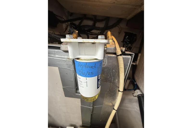  Yacht Photos Pics Fuel filter in 2015 Sea Ray 370 Venture engine compartment, labeled "Replaced 9/10/25".