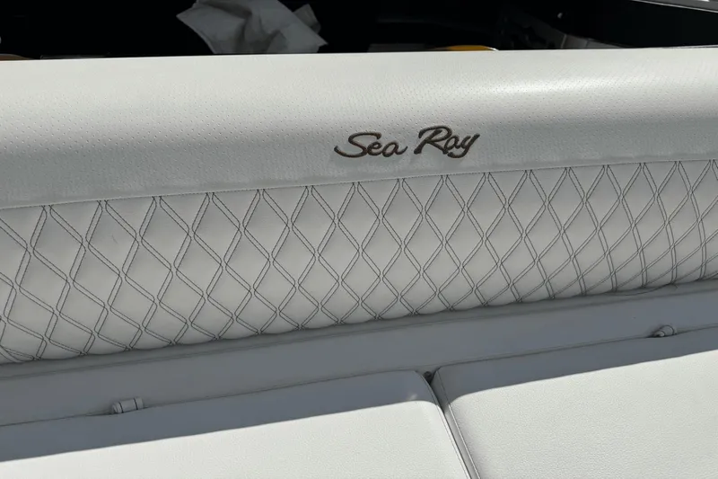  Yacht Photos Pics White leather seating with "Sea Ray" logo on 2019 Sea Ray 310 SLX boat.