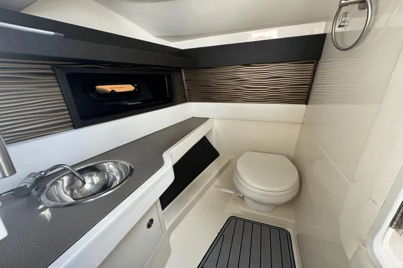  Yacht Photos Pics Luxurious 2019 Sea Ray 310 SLX boat bathroom with modern sink and toilet.