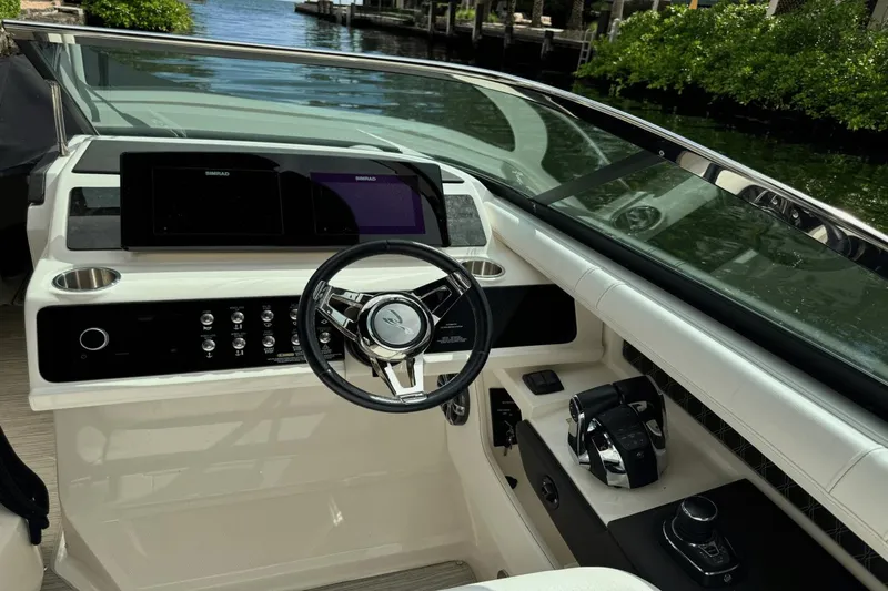  Yacht Photos Pics 2019 Sea Ray 310 SLX boat cockpit with modern steering and control panel.