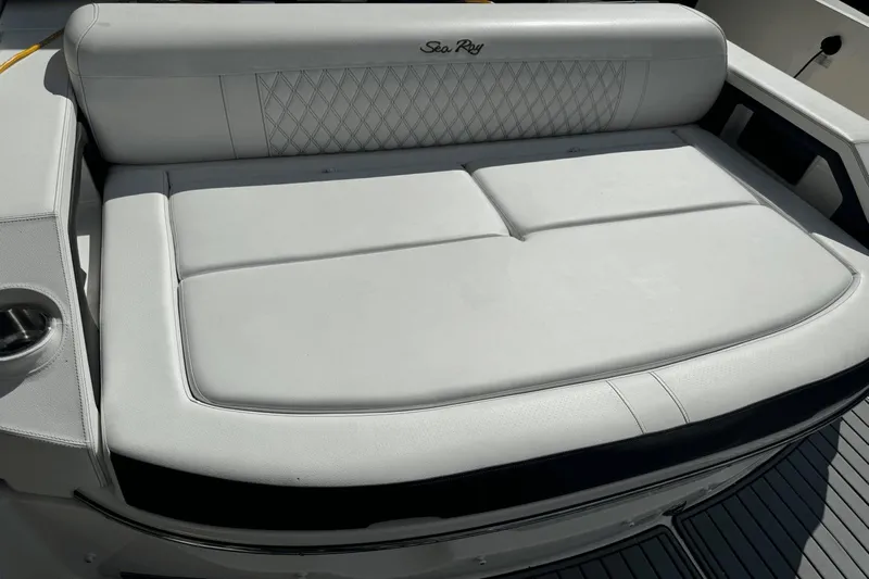  Yacht Photos Pics Luxurious seating on a 2019 Sea Ray 310 SLX boat, featuring elegant white upholstery.