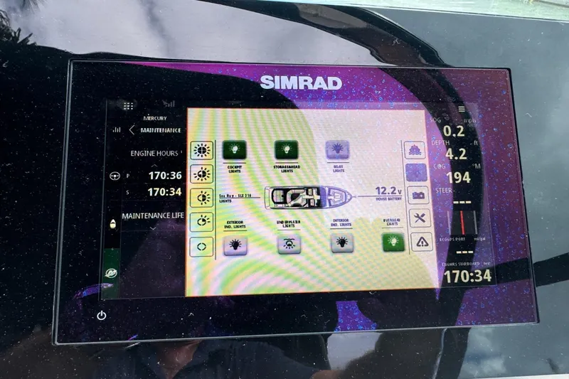  Yacht Photos Pics Simrad display on 2019 Sea Ray 310 SLX showing engine hours and maintenance data.