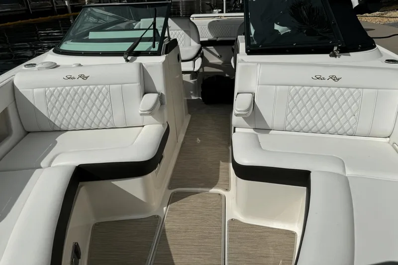  Yacht Photos Pics 2019 Sea Ray 310 SLX boat interior with white leather seating and elegant design.