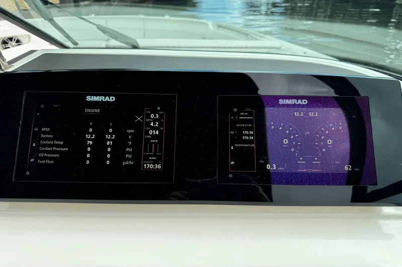  Yacht Photos Pics Dashboard of 2019 Sea Ray 310 SLX with Simrad displays showing engine data.