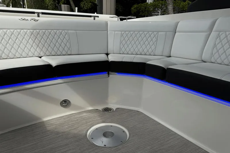  Yacht Photos Pics Luxurious seating area on 2019 Sea Ray 310 SLX boat with blue LED lighting.