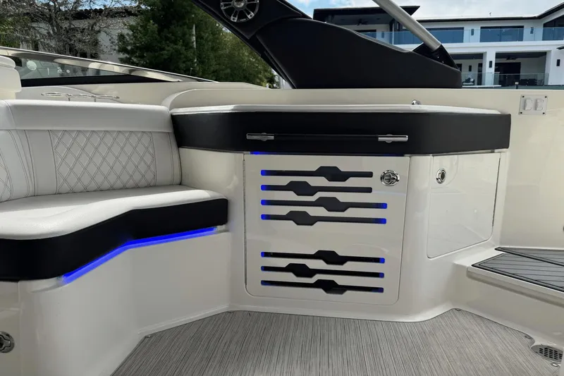  Yacht Photos Pics Interior of 2019 Sea Ray 310 SLX boat with modern seating and blue LED lighting.