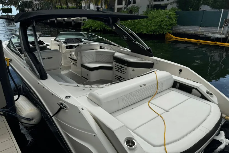  Yacht Photos Pics 2019 Sea Ray 310 SLX luxury boat docked, featuring spacious seating and modern design.