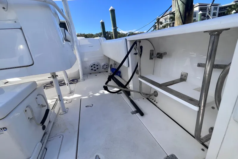  Yacht Photos Pics 2008 Intrepid 370 Cuddy boat interior with storage and seating area.