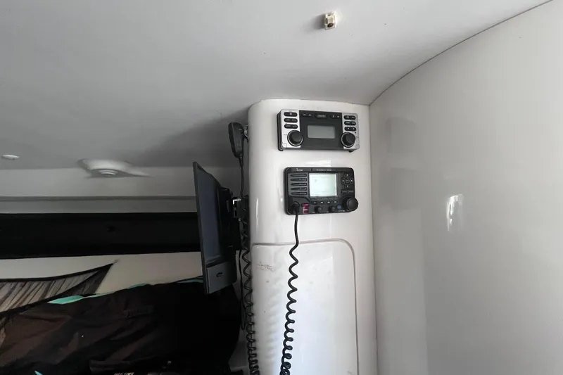  Yacht Photos Pics Interior of a 2008 Intrepid 370 Cuddy with mounted communication devices.