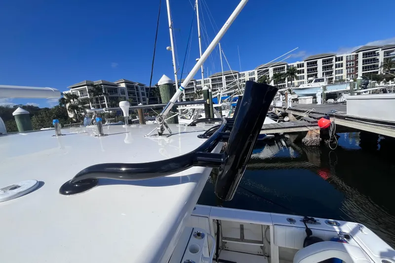  Yacht Photos Pics 2008 Intrepid 370 Cuddy boat docked at marina with clear blue sky.