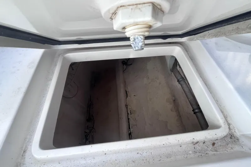  Yacht Photos Pics Open storage compartment on a 2008 Intrepid 370 Cuddy boat.