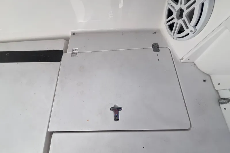  Yacht Photos Pics 2008 Intrepid 370 Cuddy deck with storage hatch and speaker.